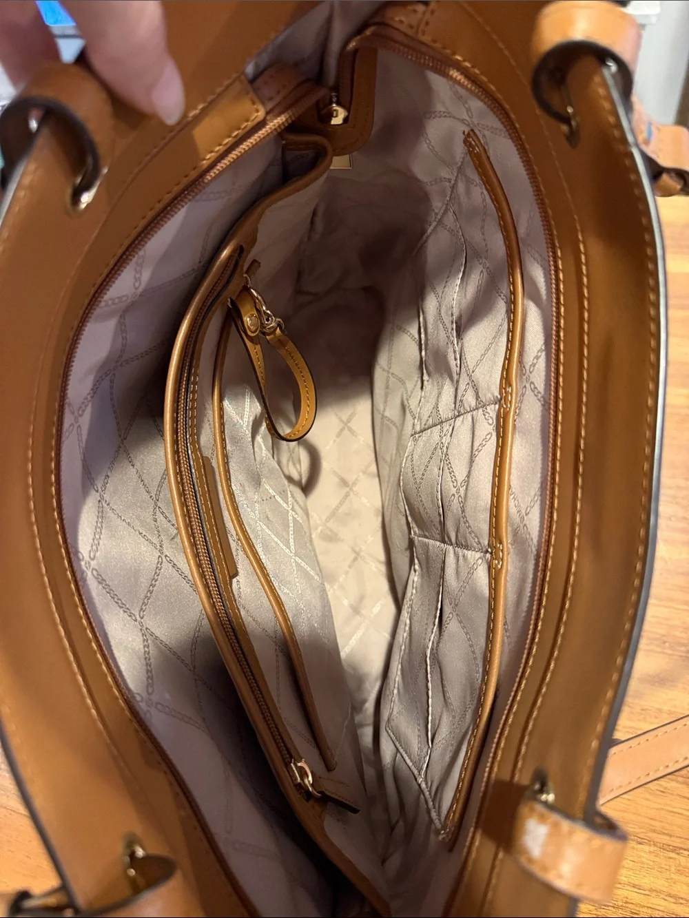 Michael Kors measures 14x16